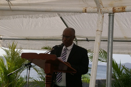 Premier of Nevis, Hon. Joseph Parry making remarks during the memorial service